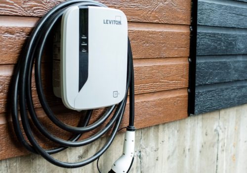 image of a Leviton EV charger on the wall